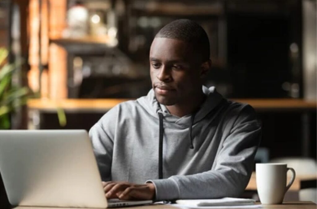 guy studying with laptop